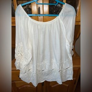 Blouse with flowering detail